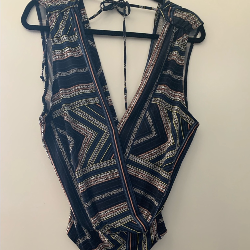 Blue body suit with details